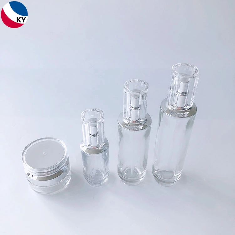 Luxury Round Bottom 30g 50g 30ml 50ml 100ml Cream Jar Clear Glass Pump Bottle with Silver Pump Acrylic Cap